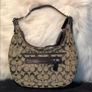 Brown coach logo purse